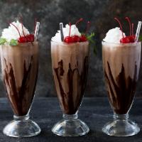 Black Forest Milkshake · Chocolate ice cream, fresh strawberries and chocolate syrup topped with our homemade whipped...