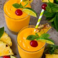 Mango Smoothie · Mango, banana and fresh squeezed orange juice.