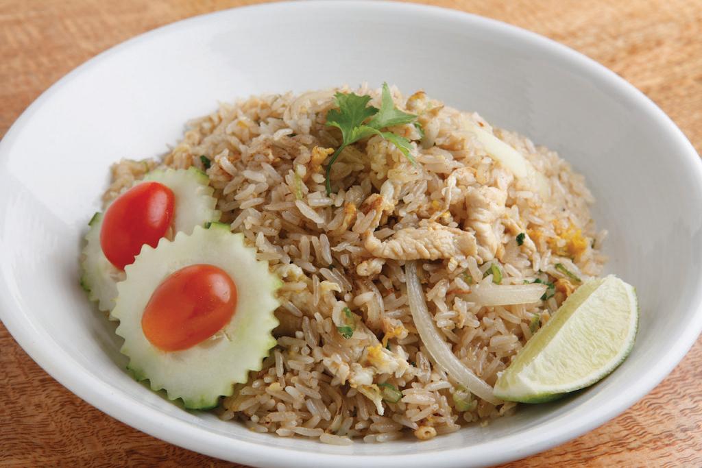 Thai Fried Rice · Stir fried with egg, onions, scallions and flavorful chef’s sauce