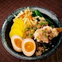 Flamed Pork Rice Bowl · Diced pork cooked in marinade on a bed of rice. Topped with green onion and sesame seeds. Si...