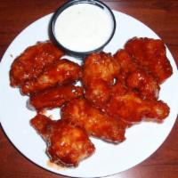 1 lb Regular Wings · Served with a side of ranch dressing.