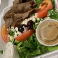 Mini Gyro Salad · Smaller Version Of Our large Gyro Salad With Athenian Salad, Gyro Meat, Tzatziki and Greek D...
