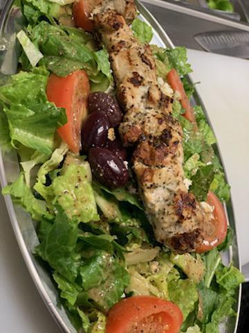 Athenian With Chicken · Athenian salad with one all-natural chicken skewer