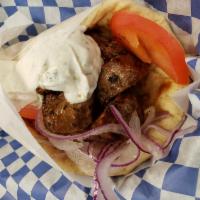 Beef Pita · Charbroiled beef sirloin marinated Greek style served with salad and side