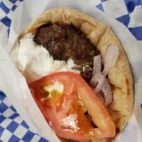 Bifteki Pita · Fresh angus ground beef strips wrapped in choice of pita with tzatziki, red onions and tomat...
