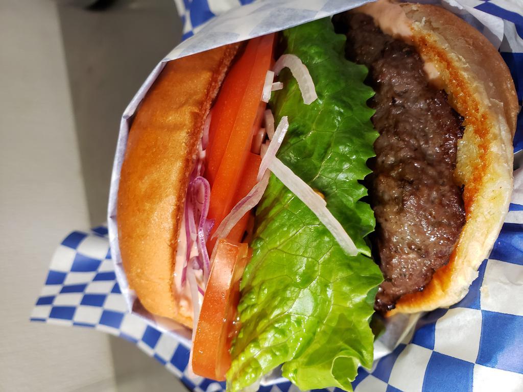 Greek Burger · Traditional Greek 1/2 Angus beef patty served on a gourmet bun with Feta Cheese, lettuce red onions, tomatoes and our own thousand island