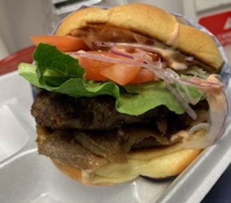 Gyro Burger · Traditional Greek 1/2 Angus beef patty with gyro meat (beef/lamb) served on a gourmet bun with lettuce red onions, tomatoes and our own thousand island