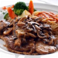 Veal Marsala · Veal sauteed in Marsala wine, garlic and mushrooms. Served with vegetables, pasta, bread and...
