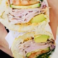 House Special Sandwich · Turkey breast, fried capocollo, mayo, onions, cucumbers, tomatoes, lettuce, avocado, and jal...