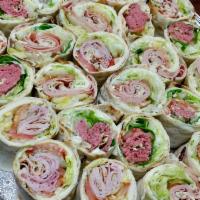 Wrap Platter · SERVES 10 PEOPLE.

Includes: Ham, Turkey, Roast Beef, Italian Combo, Vegetarian
Condiments: ...