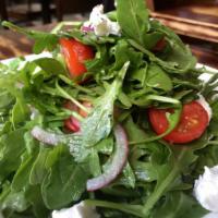 Arugula Salad · Fresh baby arugula, cherry tomato, shaved Parmigiano cheese, red onion di tropea, sea salt, ...