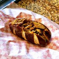 Hot Dog w/grilled onions, sauerkraut ,deli mustard · 