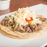 Taco (Corn Tortilla) · A Soft Corn Tortilla Topped with your Choice of Meat, lettuce, tomato, sour cream and cheese.