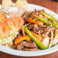 Fajita Plate · Grilled strips of onion, green pepper, tomato and your choice of steak or chicken served wit...