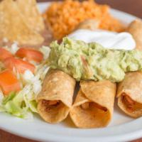 Flauta Plate · Three flute-shaped tacos filled with chicken and cheese, served with rice, beans, lettuce, t...