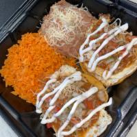 Huevos Rancheros · 2 eggs on corn tortilla, topped with house salsa, sour cream and jack cheese. Side of rice a...