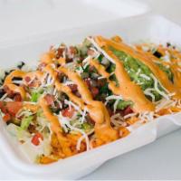 Veggie Bowl · Rice, black beans, lettuce, pico de gallo, sour cream, jack cheese and guacamole topped with...