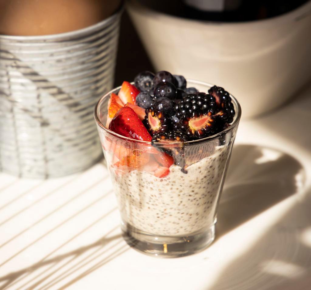 Chia Pudding · Overnight chia with non-dairy milk, dates, oats, topped with house-made granola and seasonal fruits 