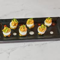 Sriracha Deviled Eggs · A 1/2 dozen peppered candied bacon and blue cheese deviled eggs, drizzled with AIB buffalo s...