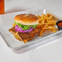 Mahi Sandwich · A blackened mahi filet cooked to perfection with lettuce, tomato, onion, and pickles, and to...
