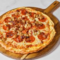The Carnivore Pizza · Hand tossed and topped with house made AIB pizza sauce, pepperoni, Italian sausage, applewoo...