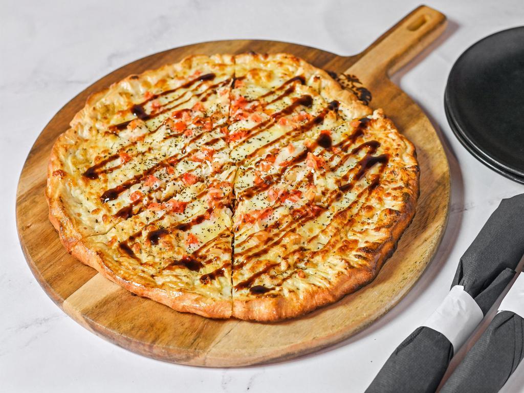 White Pizza · Hand tossed and topped with seasoned ricotta, roasted garlic,
tomatoes, mozzarella, parmesan, and topped with balsamic
reduction