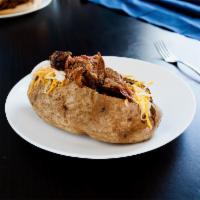 Loaded Baked Potato · Choice of 1 signature meat with butter, sour cream and cheese.add pastrami for the 4$ more