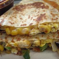 Veggie Quesadilla · A mixture of Corn Black beans, Onions, Bell peppers, Cheese with hot sauce, and sour cream o...