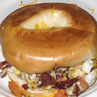 Stuff Bagel · Bacon, sausage, egg, cheese, chipotle dressing, tomatoes.