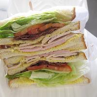 Club Sandwich · Turkey, ham, and bacon on white bread. Mustard and mayo, Toasted