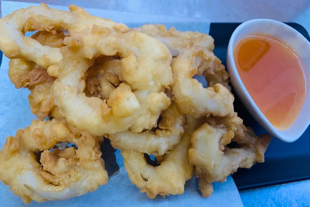 10. Fried Calamari · Deep fried calamari, served with sweet chili sauce.