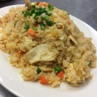 Thai Fried Rice · Jasmine Thai rice stir-fried with pea, carrot, onion and egg.