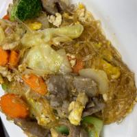 Pad Woon Sen · Glass noodles stir-fried with egg, onion, tomato, carrot celery and bell pepper.
