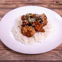 CS3. Sesame Chicken · Specialty marinated batter-fried chicken breast glazed with a sweet sesame sauce. Topped wit...