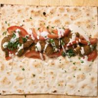 Falafel Sandwich Combo · Falafel Sandwich: falafel, tomato, parsley, and tahini sauce wrapped up in bread. 
Served wi...