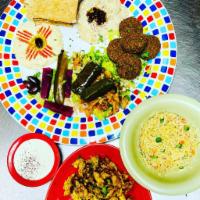House Sampler · Every bit of Everything. Good for sharing for two people. 
Vegetarian Platter, Pickles, choi...