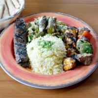 Mix and Match Kebab · Any Three skewers of Kebabs served with rice, dolmas, fattoush salad, hummus and pita. Chick...