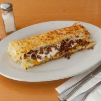 Big Stuffed Hash Browns · Hash browns stuffed with bacon, sausage, onions, sour cream, jack and cheddar.
