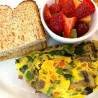 Veggie Omelet · Spinach, mushrooms, bell peppers, onions and tomatoes.