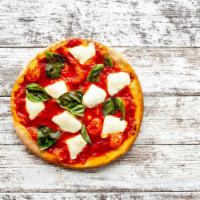 Margherita Pizza · Italian tomato sauce, fully loaded with fresh mozzarella, fresh basil and a drizzle of olive...