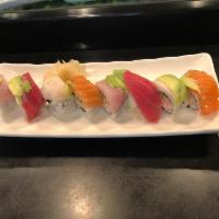 M4. Rainbow Maki · Crabmeat and avocado roll wrapped with assorted fish and avocado.