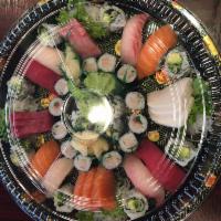 2. Chefs Choice of Sushi and Sashimi Party Platter · Chefs choice of 8 pieces sushi and 12 pieces sashimi and 4 small rolls.