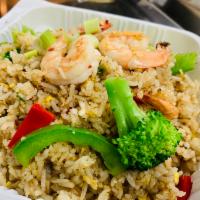 3. Spicy Fried Rice    · Pan-fried steamed rice with egg, broccoli, chili, bell pepper and basil, your choice of chic...