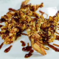 2 Soft Shell Crab · Deep fried with eel sauce.