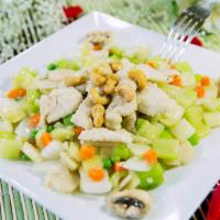 Cashew Nut Chicken · Chicken stir fried with fresh assorted vegetables in light sauce with cashew nuts on top. Se...