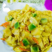 Curry Chicken · Chicken stir fried in a curry sauce with green peppers, onions and carrots. Served with stea...