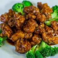 General Tso's Chicken · Crispy breaded chicken sauteed in rich house made General Tso's sauce. Served with steamed r...