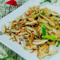 Mu Shu Chicken · Sliced chicken, scrambled egg, cabbage, onions, carrots and stir fried in house sauce. Serve...