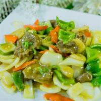 Curry Beef · Beef sauteed with garlic, onions, green peppers and carrots in spicy curry sauce. Hot and sp...