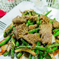Green Bean Beef · Beef sauteed with fresh green beans in special black bean sauce. Served with steamed rice.